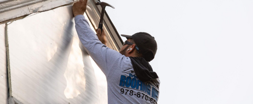 Brian LeBlanc Roofing worker fixing roof