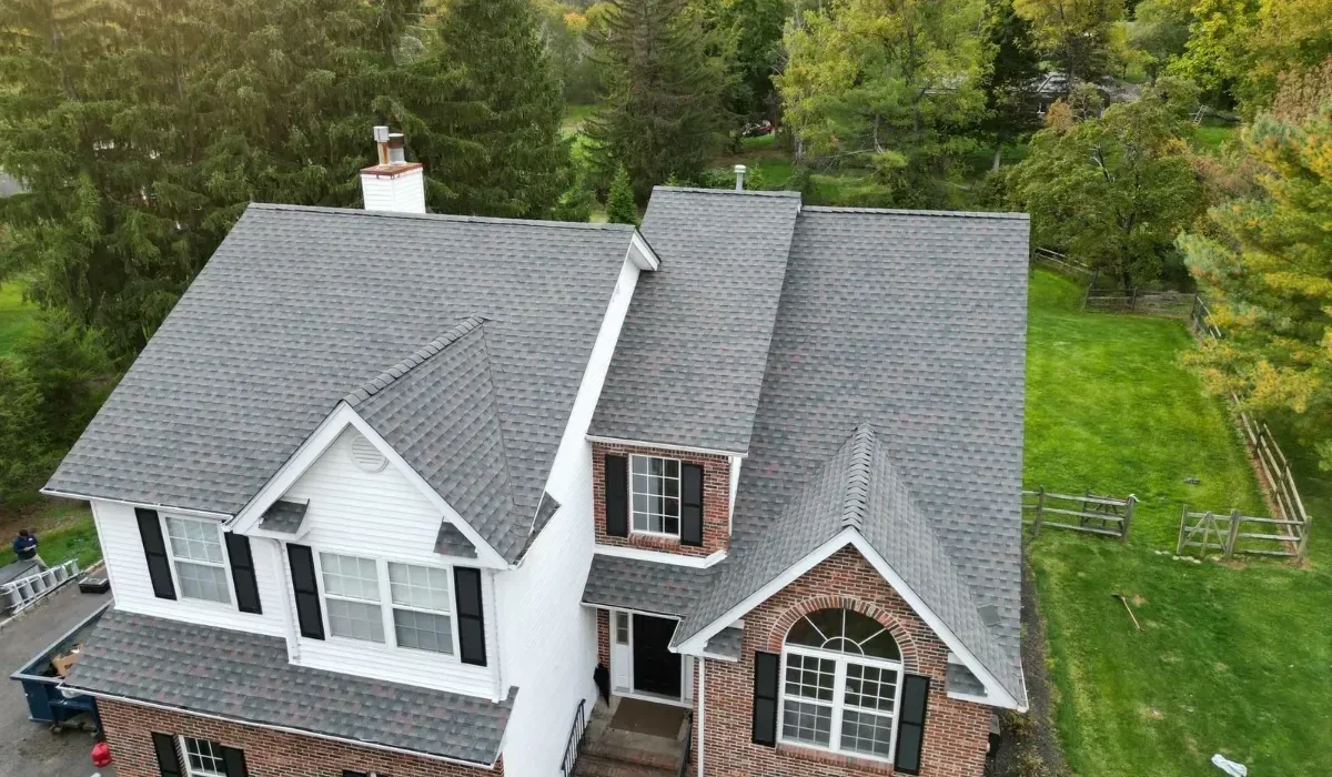 Newly installed asphalt shingle roof on a Massachusetts home