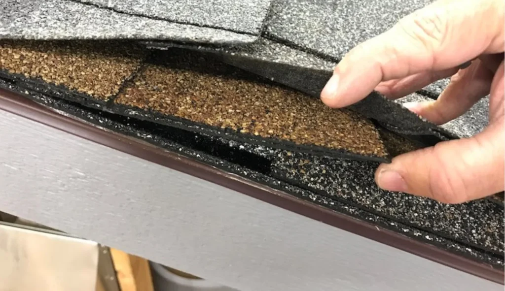 Rake edge close-up showing two stacked shingle layers