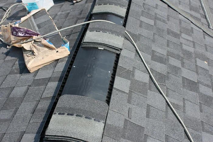 Roof deck and underlayment installation showing roofing layers